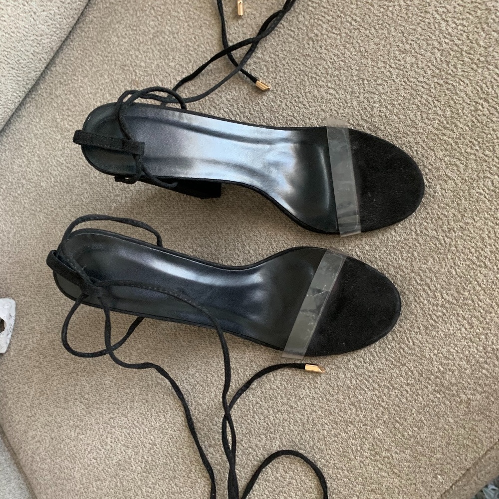 Black strap up heels